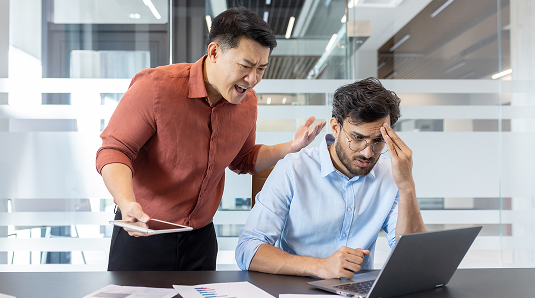 Stressful workplace confrontation illustrating unstructured marketplace dynamics
